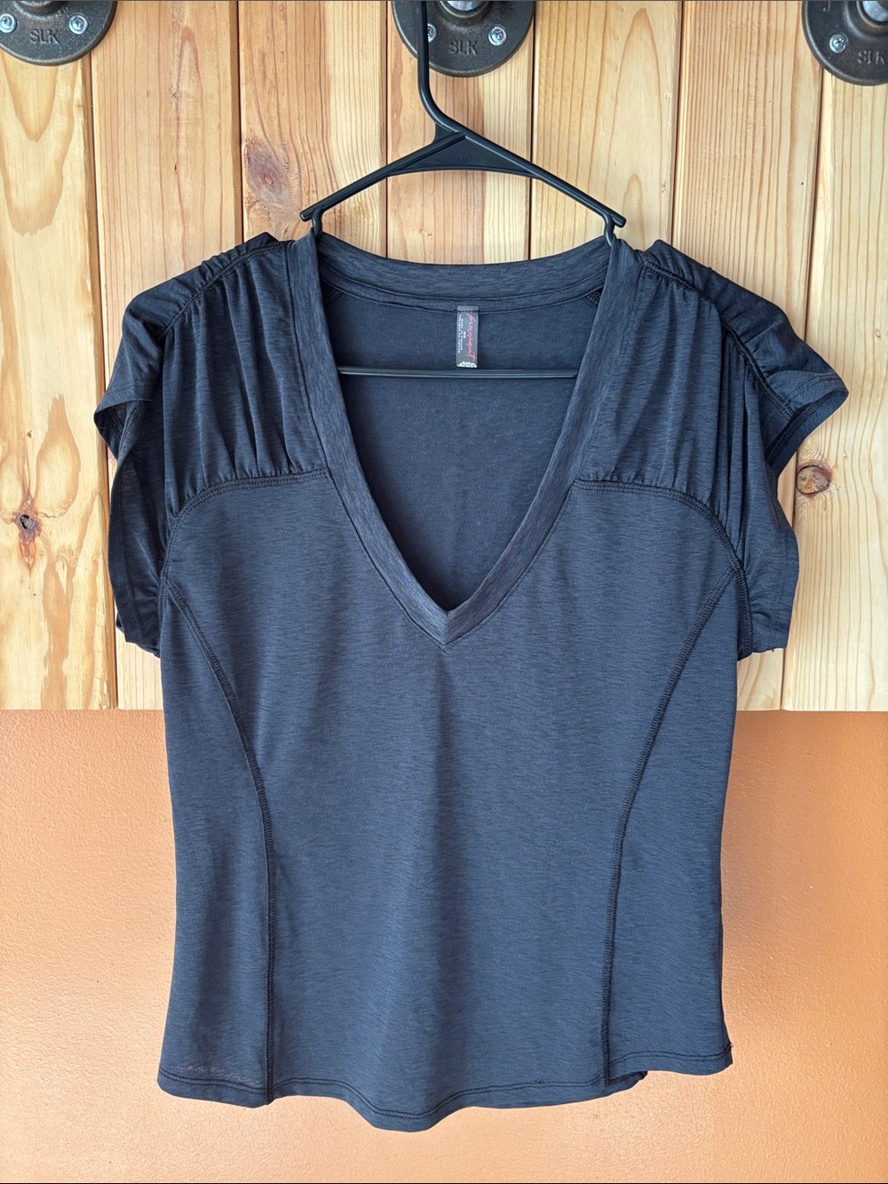 FP Movement by Free People V-Neck Short Sleeve Tee with Ruched Shoulders